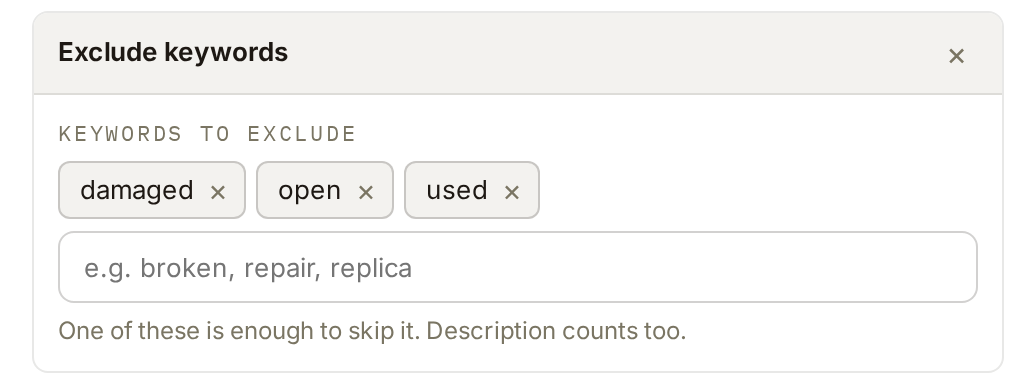 The same editor on the web: an Exclude keywords card with damaged, open and used entered as chips