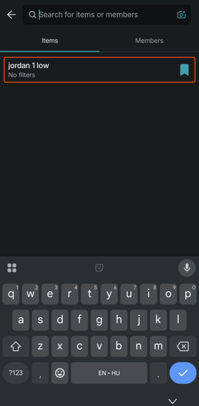 Vinted app search screen with a saved search listed under the Items tab